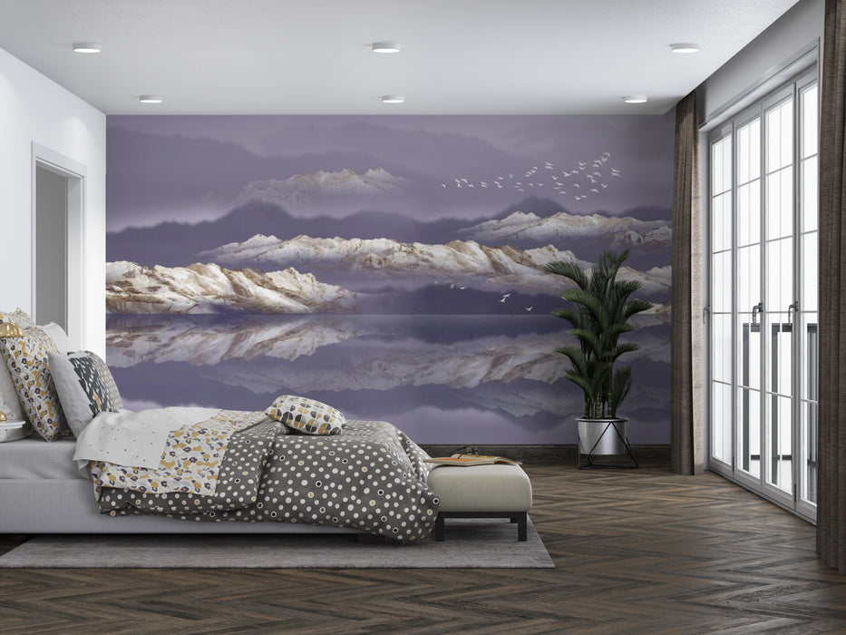 Snowy mountains faintly appear in the wallpaper mist