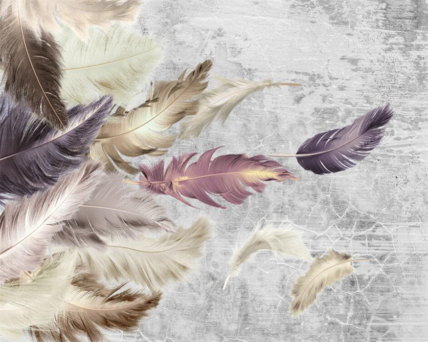 Soft colored feathers on wallpaper