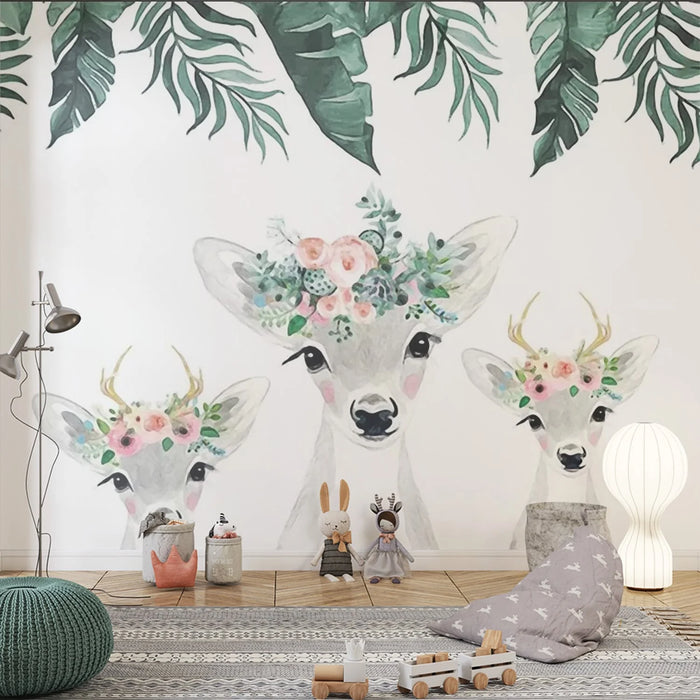 Wallpaper mural of three playful little deer with flower garlands on their heads