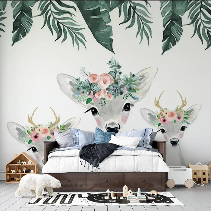 Wallpaper mural of three playful little deer with flower garlands on their heads